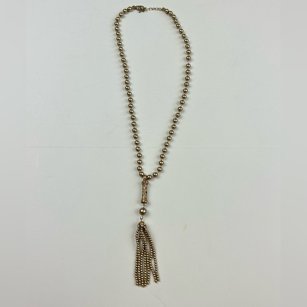 Gold beaded tassel necklace